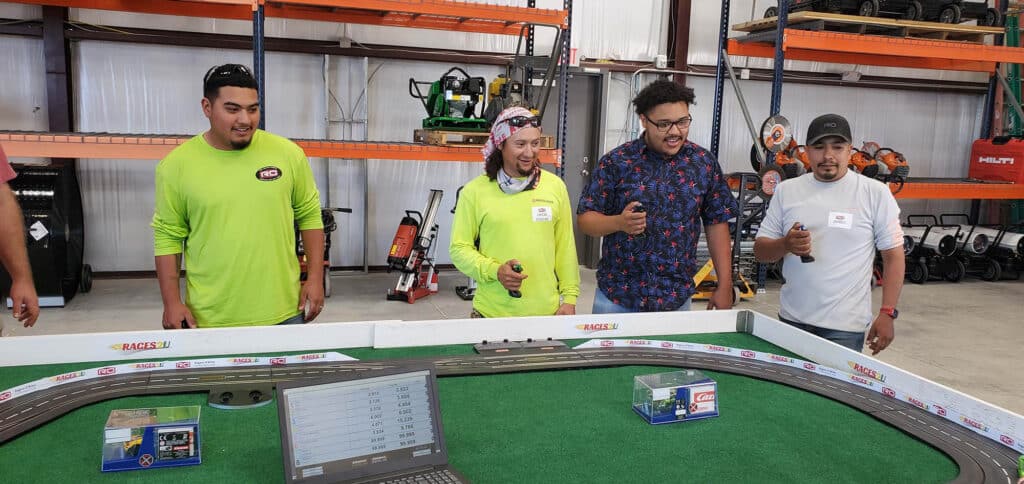 team building slot car racing